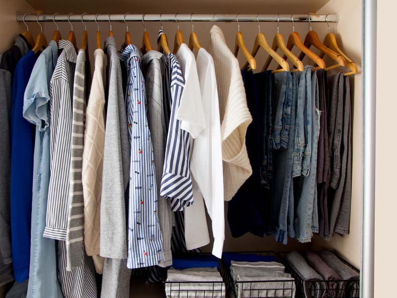 Clothing hanging in a closet